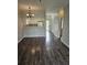 Open floor plan with wood flooring and view of kitchen area at 102 Scotch Broom Dr. # B-204, Little River, NC 29566