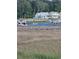 Waterfront home with a dock and boat access, with lush greenery and scenic views at 102 Scotch Broom Dr. # B-204, Little River, NC 29566
