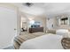 Bedroom featuring two beds, dresser with a television, and a bright atmosphere at 1105 S Ocean Blvd. # 110, Myrtle Beach, SC 29577