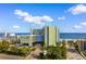 Exterior of building with view of ocean at 1105 S Ocean Blvd. # 110, Myrtle Beach, SC 29577