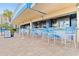 Charming outdoor bar area with sleek seating, perfect for enjoying drinks with friends and Gathering at 1105 S Ocean Blvd. # 110, Myrtle Beach, SC 29577