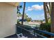 Relaxing pool area view, surrounded by palm trees and lounge chairs at 1105 S Ocean Blvd. # 110, Myrtle Beach, SC 29577