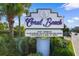 Attractive sign advertising Coral Beach's great amenities, including a bowling alley, restaurants, and multiple pools at 1105 S Ocean Blvd. # 110, Myrtle Beach, SC 29577