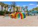 Fun waterpark area featuring vibrant play structures and a shallow pool, perfect for children to enjoy at 1105 S Ocean Blvd. # 110, Myrtle Beach, SC 29577