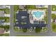 Aerial view of the community pool featuring ample parking and lush landscaping at 1224 Checkerberry St., Longs, SC 29568