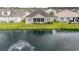 Back exterior view with a pond for this home at 1224 Checkerberry St., Longs, SC 29568