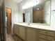 Bathroom featuring tile floors, bright lighting, double sinks and plenty of counter space at 1224 Checkerberry St., Longs, SC 29568