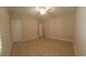 A clean bedroom provides a neutral space with tile floor for versatile decor options at 1224 Checkerberry St., Longs, SC 29568