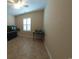 Bright bonus room with neutral paint, tile floor, and a window with plantation shutters for a light and airy feel at 1224 Checkerberry St., Longs, SC 29568