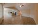 Open floor plan with tile floors leading to the kitchen area and dining area at 1224 Checkerberry St., Longs, SC 29568