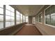 Enclosed patio with plenty of natural light and peaceful views of the pond at 1224 Checkerberry St., Longs, SC 29568