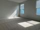 Bright bedroom with plush carpet and ample natural light at 1232 Lady Bird Way, North Myrtle Beach, SC 29582