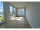 Bright sunroom with many windows and access to backyard at 1232 Lady Bird Way, North Myrtle Beach, SC 29582