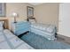Comfortable bedroom with twin bed, light blue dresser, and nautical themed decorations at 1310 N Waccamaw Dr. # 208, Garden City Beach, SC 29576