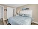 Comfortable bedroom featuring a large bed, closet, and neutral walls at 1310 N Waccamaw Dr. # 208, Garden City Beach, SC 29576