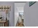 Inviting hallway leads to a cozy living space with ocean views in this beachside condo at 1310 N Waccamaw Dr. # 208, Garden City Beach, SC 29576