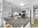 Modern kitchen featuring granite countertops, and stainless steel appliances at 1310 N Waccamaw Dr. # 208, Garden City Beach, SC 29576
