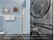 A stacked washer and dryer inside unit for convenience and an alternative to the common area laundry facility at 1310 N Waccamaw Dr. # 208, Garden City Beach, SC 29576