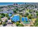 Aerial view of a community with a pool, tennis courts, and a community center at 146 Georges Bay Rd., Surfside Beach, SC 29575