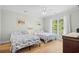 Bedroom featuring two beds, wood flooring, and natural light from the window at 146 Georges Bay Rd., Surfside Beach, SC 29575