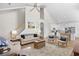 Comfortable living area with a staircase, vaulted ceiling, and seamless flow to the kitchen at 146 Georges Bay Rd., Surfside Beach, SC 29575