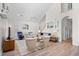 Spacious living room with vaulted ceilings, natural light, comfortable seating, and views to the entry at 146 Georges Bay Rd., Surfside Beach, SC 29575