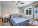 Bedroom with queen bed, ceiling fan, window, and an exterior view at 1460 Blue Tree Ct. # E, Myrtle Beach, SC 29588