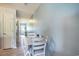 View of a dining area featuring a white table with adjacent views of hallway at 1460 Blue Tree Ct. # E, Myrtle Beach, SC 29588