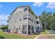 Rear exterior showing easy access to the back yard and screened in porch at 1460 Blue Tree Ct. # E, Myrtle Beach, SC 29588