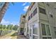 Rear exterior showing screened in porch and easy access to the back yard at 1460 Blue Tree Ct. # E, Myrtle Beach, SC 29588