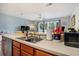 Stainless steel sink on counter in kitchen open to the breakfast and living areas at 1460 Blue Tree Ct. # E, Myrtle Beach, SC 29588