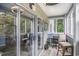 The sunroom offers a peaceful place to relax and enjoy the weather at 1460 Blue Tree Ct. # E, Myrtle Beach, SC 29588
