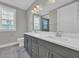 Bathroom with a double sink vanity and tile flooring at 1545 Coastal Cove Ln, Calabash, NC 28467