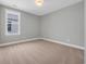 Neutral bedroom with carpet, natural light, and calming color palette at 1545 Coastal Cove Ln, Calabash, NC 28467
