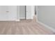 Bedroom with plush carpet, and a partial view of ensuite bathroom at 1545 Coastal Cove Ln, Calabash, NC 28467