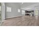 Open floor plan featuring high ceilings, natural light, and view of kitchen at 1545 Coastal Cove Ln, Calabash, NC 28467