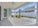 Covered patio with concrete flooring and a ceiling fan at 1545 Coastal Cove Ln, Calabash, NC 28467