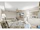 Comfortable bedroom with coastal decor and a ceiling fan at 1625 S Ocean Blvd. # 309, North Myrtle Beach, SC 29582