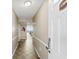Inviting hallway leading to living areas with coastal decor and tiled floors at 1625 S Ocean Blvd. # 309, North Myrtle Beach, SC 29582