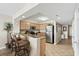 Kitchen with stainless steel appliances, granite countertops and breakfast bar at 1625 S Ocean Blvd. # 309, North Myrtle Beach, SC 29582