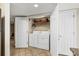 Convenient laundry room with washer and dryer, plus ample storage space at 1625 S Ocean Blvd. # 309, North Myrtle Beach, SC 29582