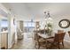 Bright living area with tile flooring, ocean view balcony, and dining space at 1625 S Ocean Blvd. # 309, North Myrtle Beach, SC 29582