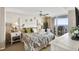 Comfortable main bedroom featuring access to the balcony and views of the ocean at 1625 S Ocean Blvd. # 309, North Myrtle Beach, SC 29582