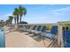 Picturesque pool deck with comfortable lounge chairs for sunny relaxation and ocean views at 1625 S Ocean Blvd. # 309, North Myrtle Beach, SC 29582
