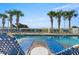 Resort pool with lounge chairs and ocean views at 1625 S Ocean Blvd. # 309, North Myrtle Beach, SC 29582