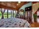 Comfortable primary bedroom with a large windows, an antique dresser, and a tranquil ambiance at 181 Halfway Rd., Nichols, SC 29581