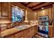 Charming kitchen featuring custom wood cabinets and countertops with stainless steel appliances at 181 Halfway Rd., Nichols, SC 29581