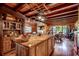 Gourmet kitchen with an island, dining area, and comfortable seating, perfect for entertaining at 181 Halfway Rd., Nichols, SC 29581