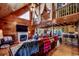 Cozy living room with a loft view, fireplace, and comfortable seating arrangements at 181 Halfway Rd., Nichols, SC 29581