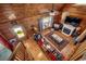 Inviting living room with hardwood floors, a fireplace, a comfortable seating area, and lots of natural light at 181 Halfway Rd., Nichols, SC 29581